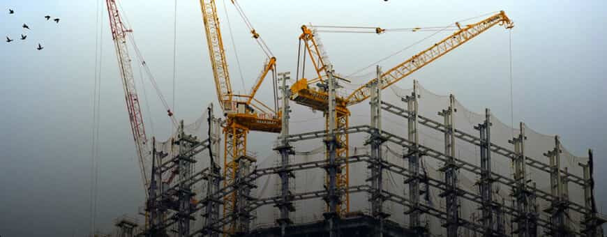 Picture of a building with cranes