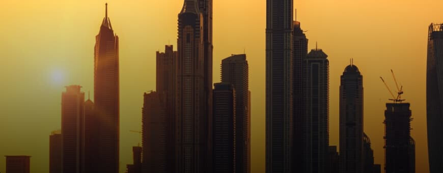 Captivating Dubai skyscrapers standing side by side as the sun sets