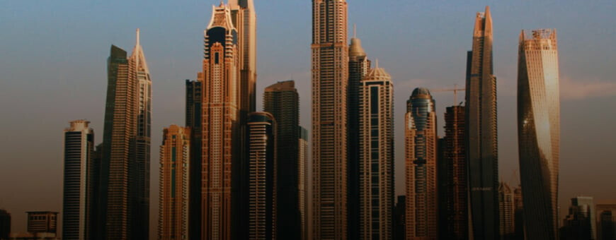 The skyline of Dubai in the sunset.